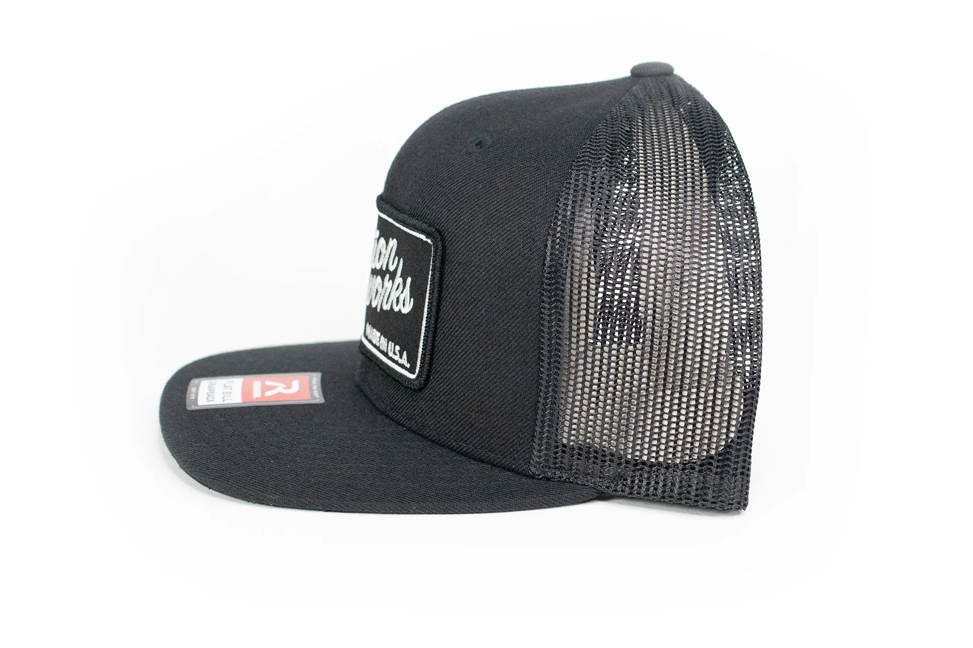 Motion Heritage Flat Bill Hat Black/Black Snapback