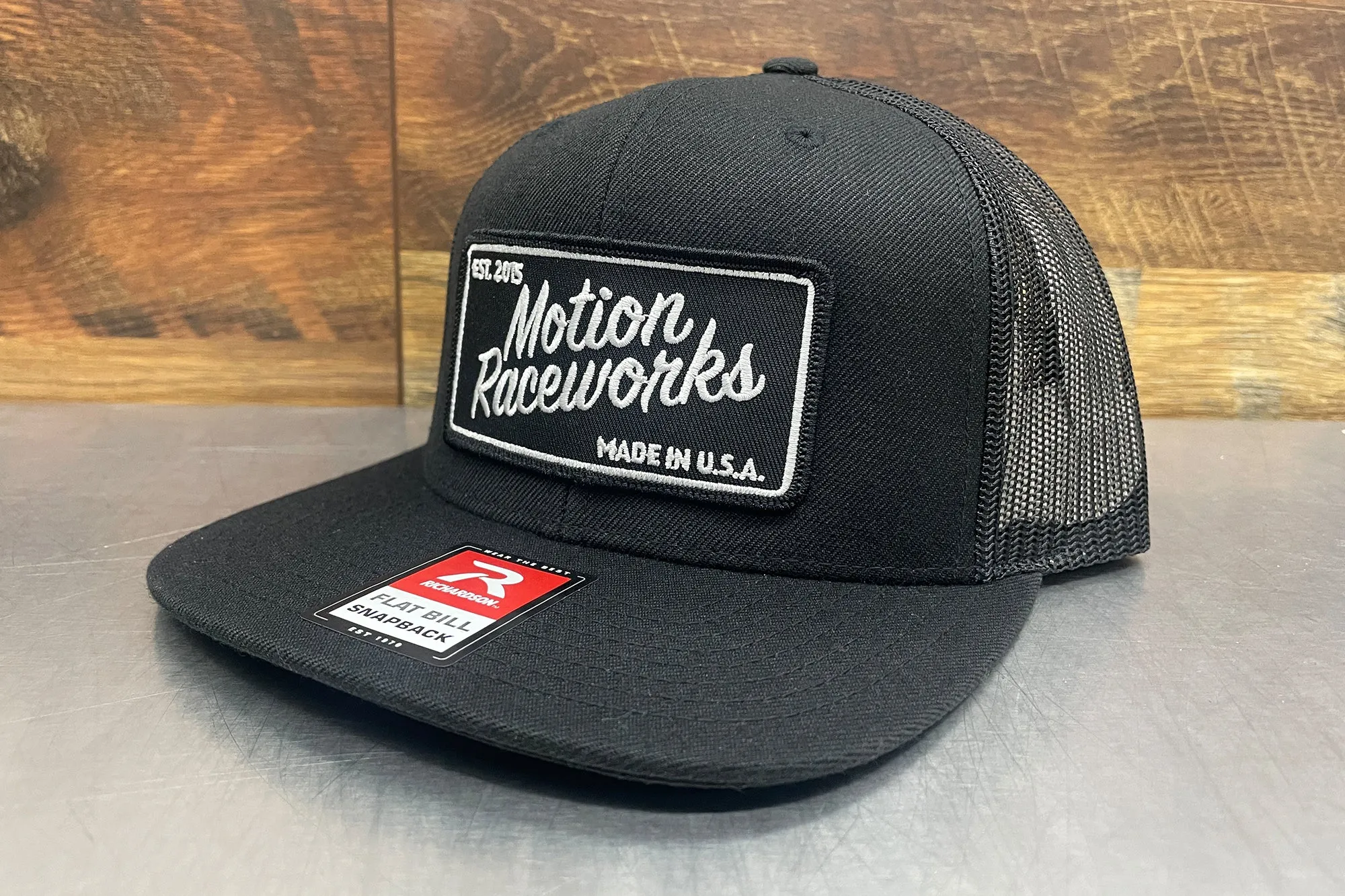 Motion Heritage Flat Bill Hat Black/Black Snapback